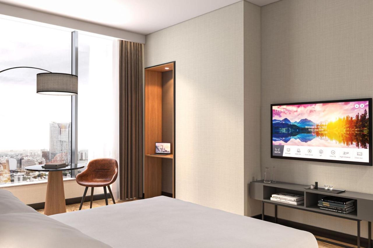 Deluxe King Room with Sofa Bed and City View