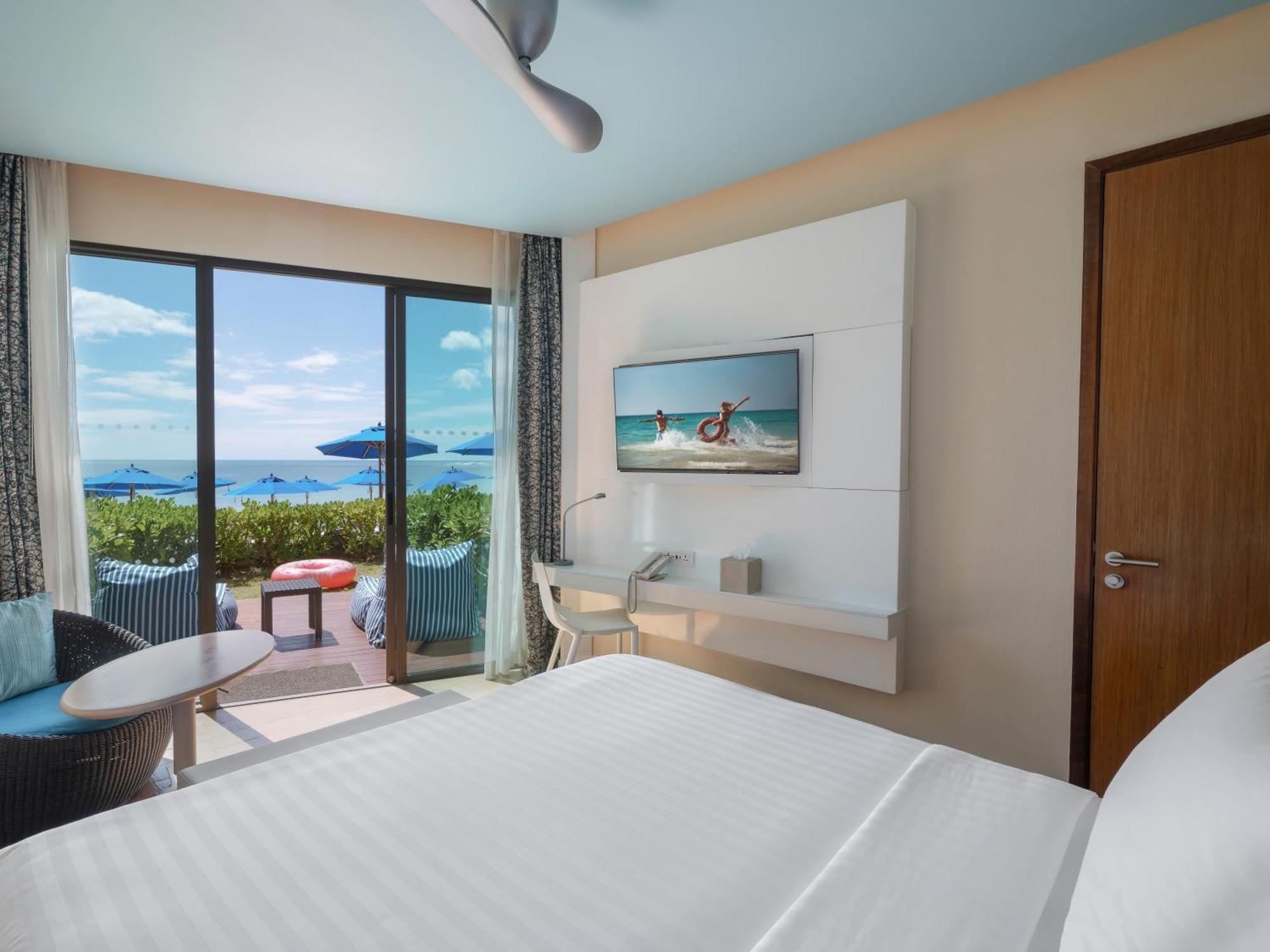 Deluxe Zimmer mit Kingsize-Bett am Strand