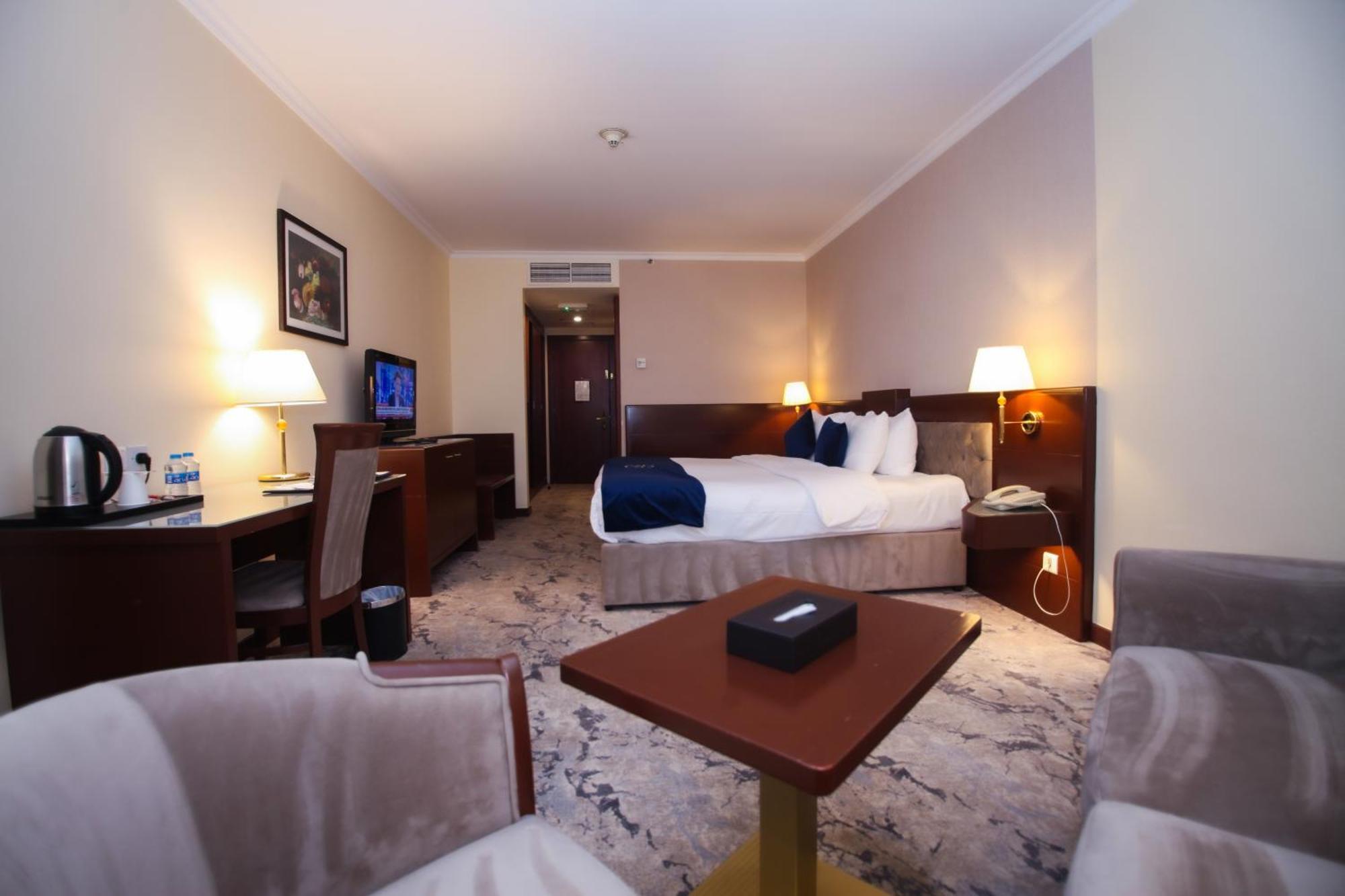Deluxe Zimmer mit Kingsize-Bett