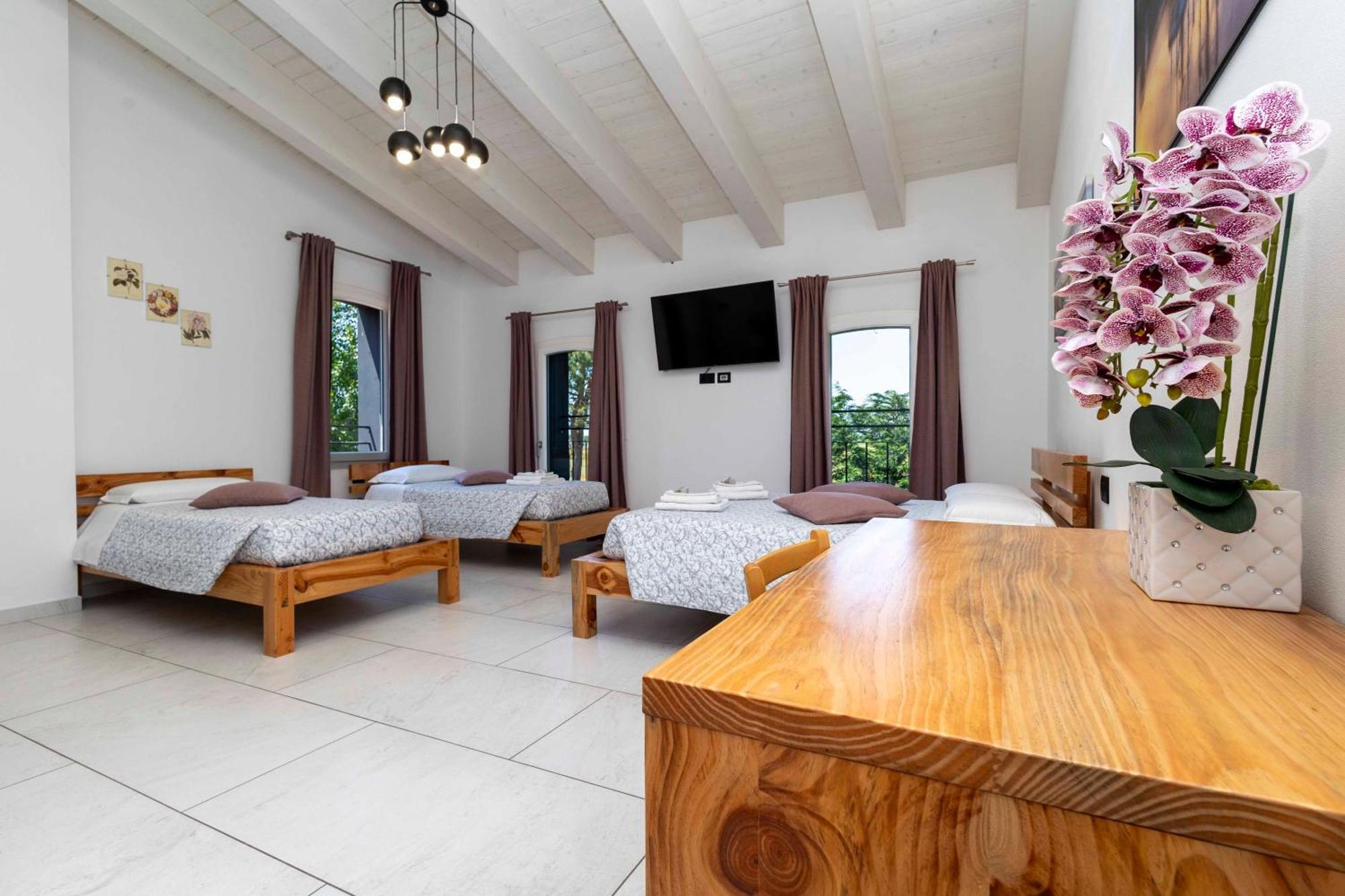 Habitación Cuádruple Deluxe