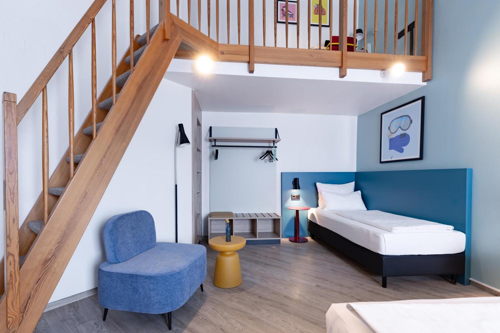 Loft mit 1 Queensize-Bett und 1 Einzelbett