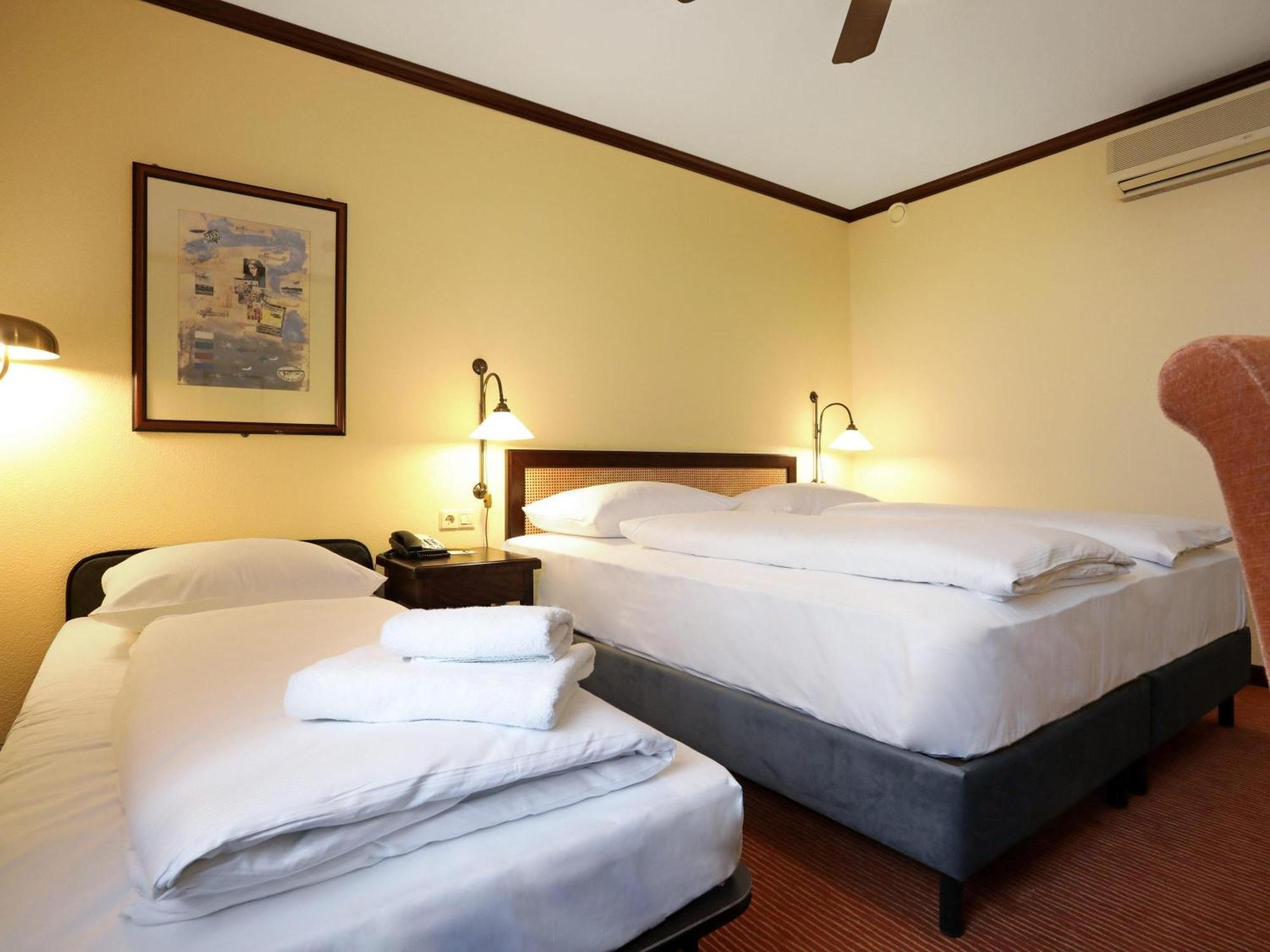 Classic Zimmer mit 1 Doppelbett und 1 Einzelbett