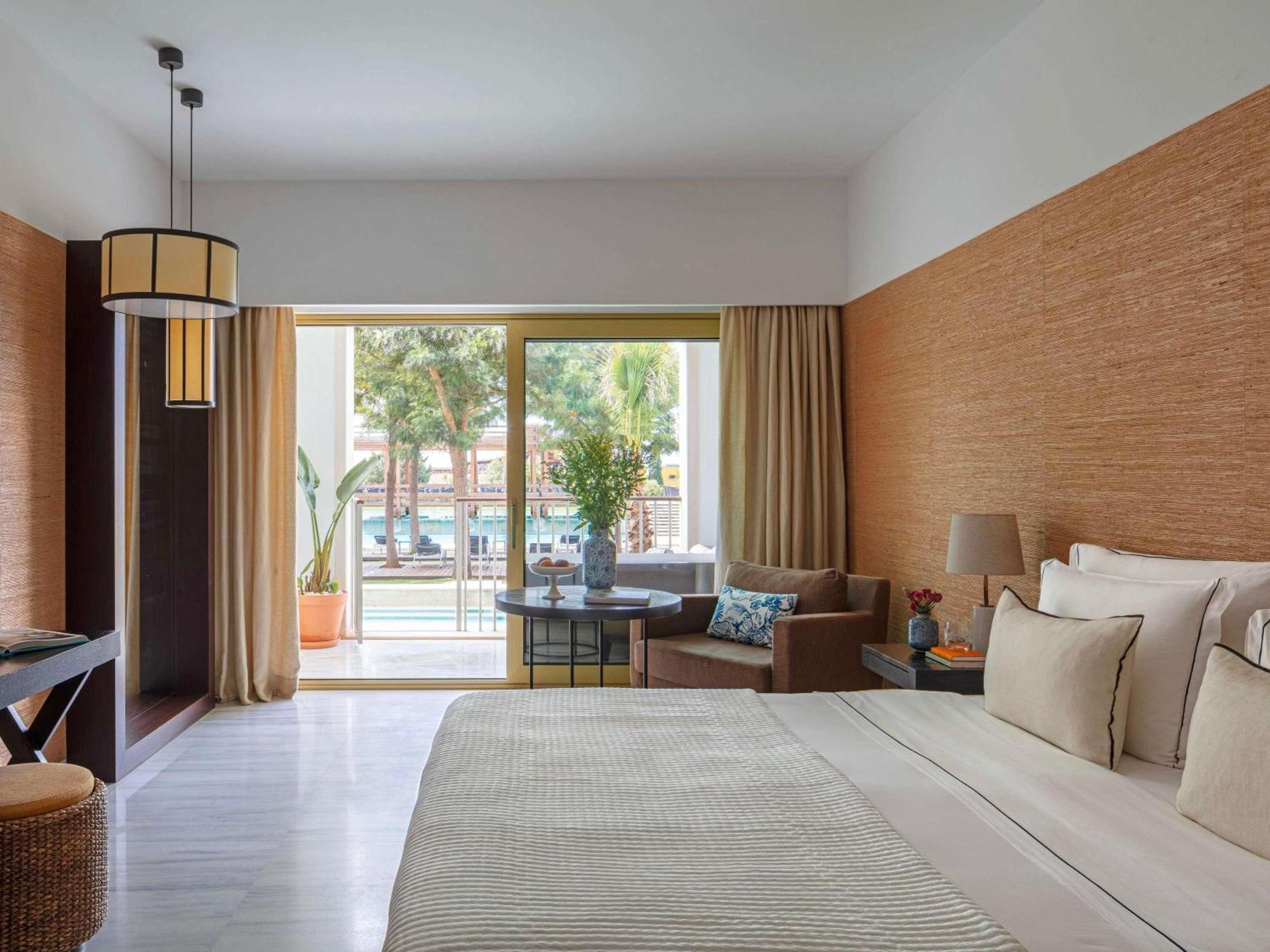 Signature King Room ith Balcony Pool Access