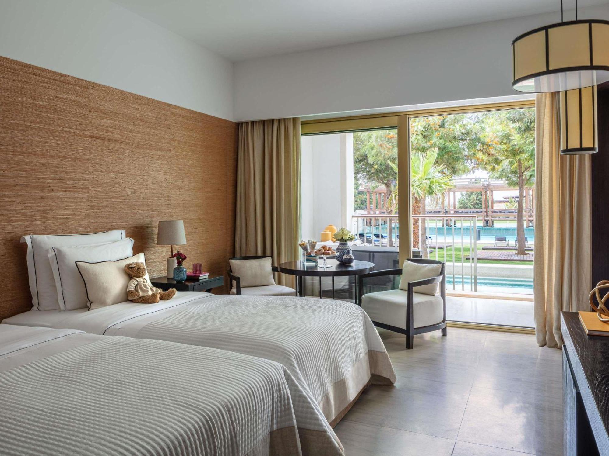 Signature Twin Room Balcony Pool Access
