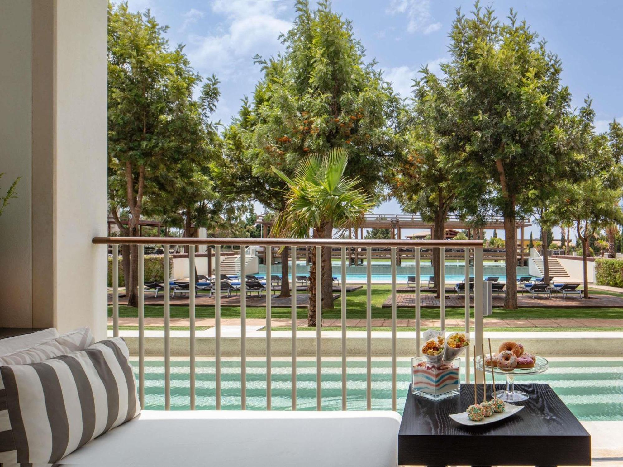 Signature Twin Room Balcony Pool Access