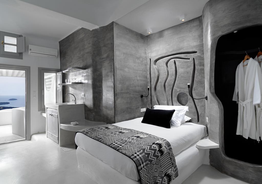 Suite de Luxe avec Hamam et Jacuzzi Extérieur Privé - Vue sur Caldera