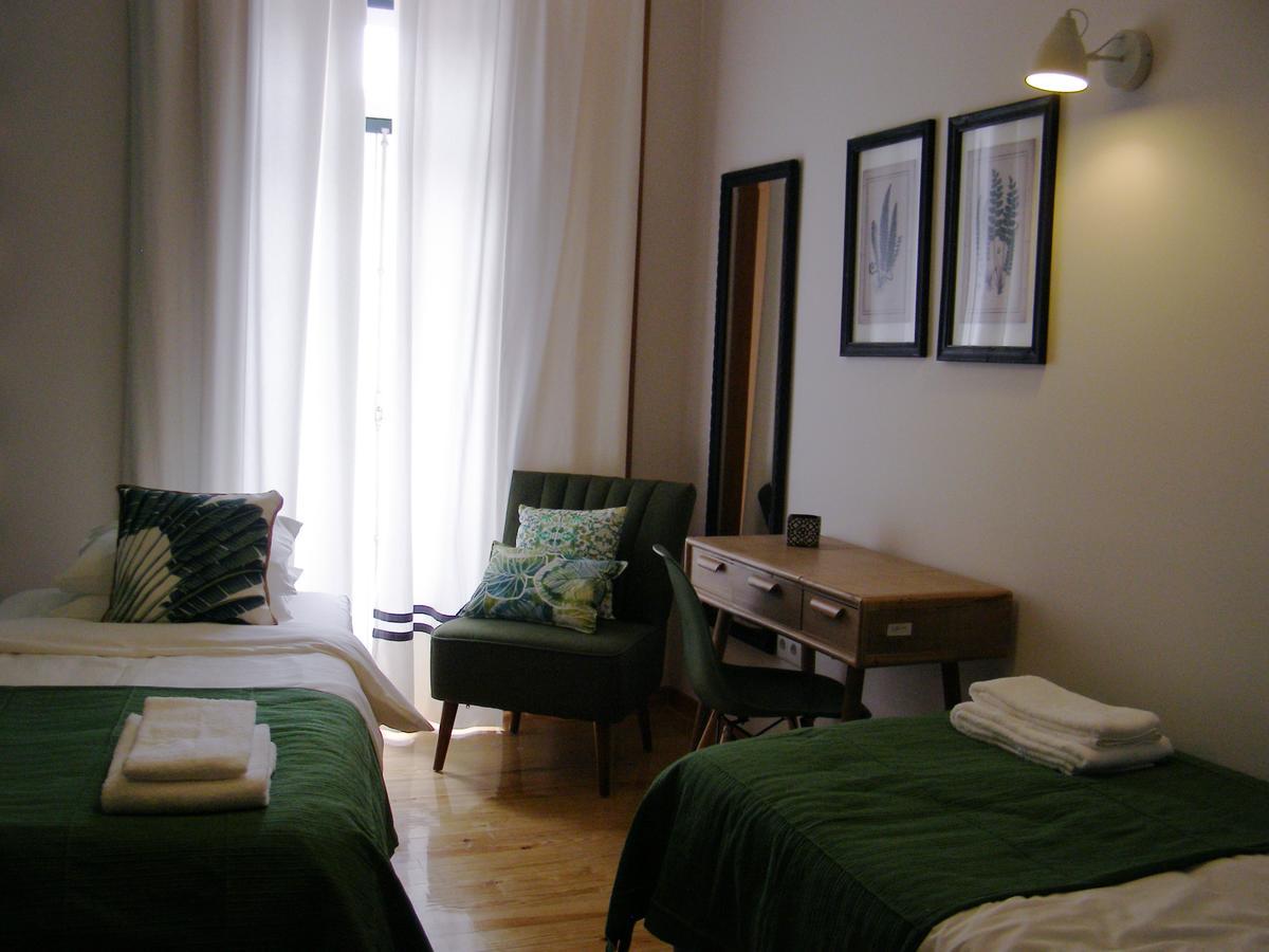 Quarto Twin com Casa de Banho Partilhada