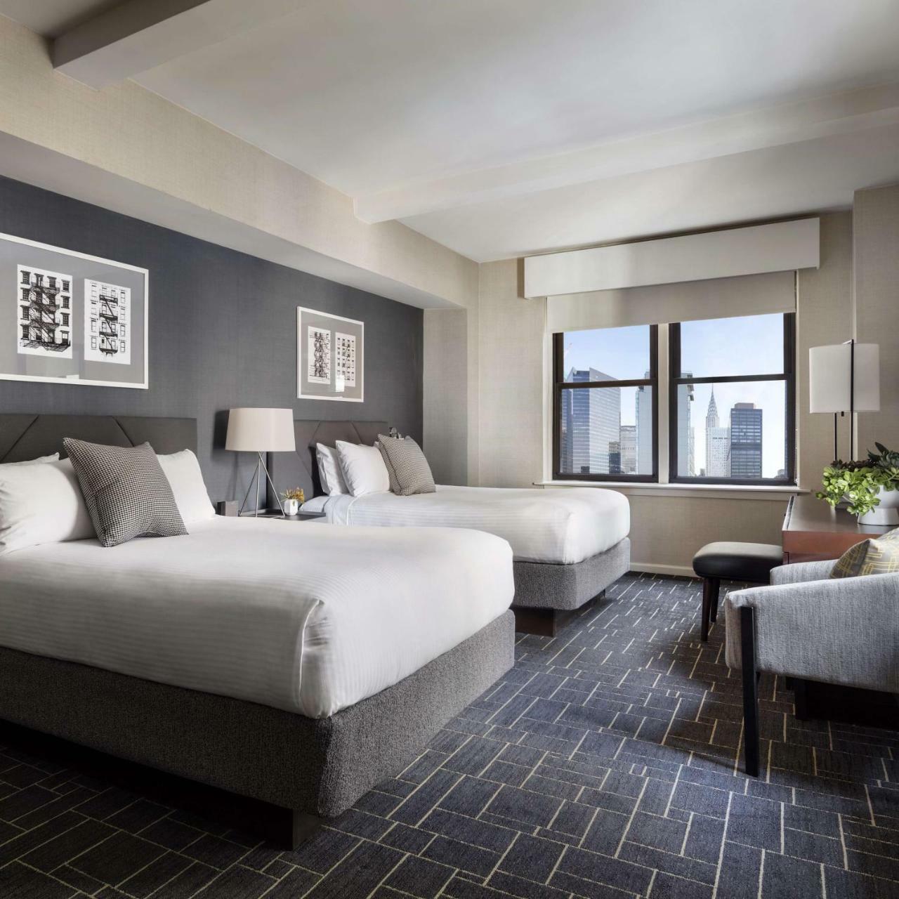 Deluxe Studio with Two Queen Beds,812687850:JPEG
