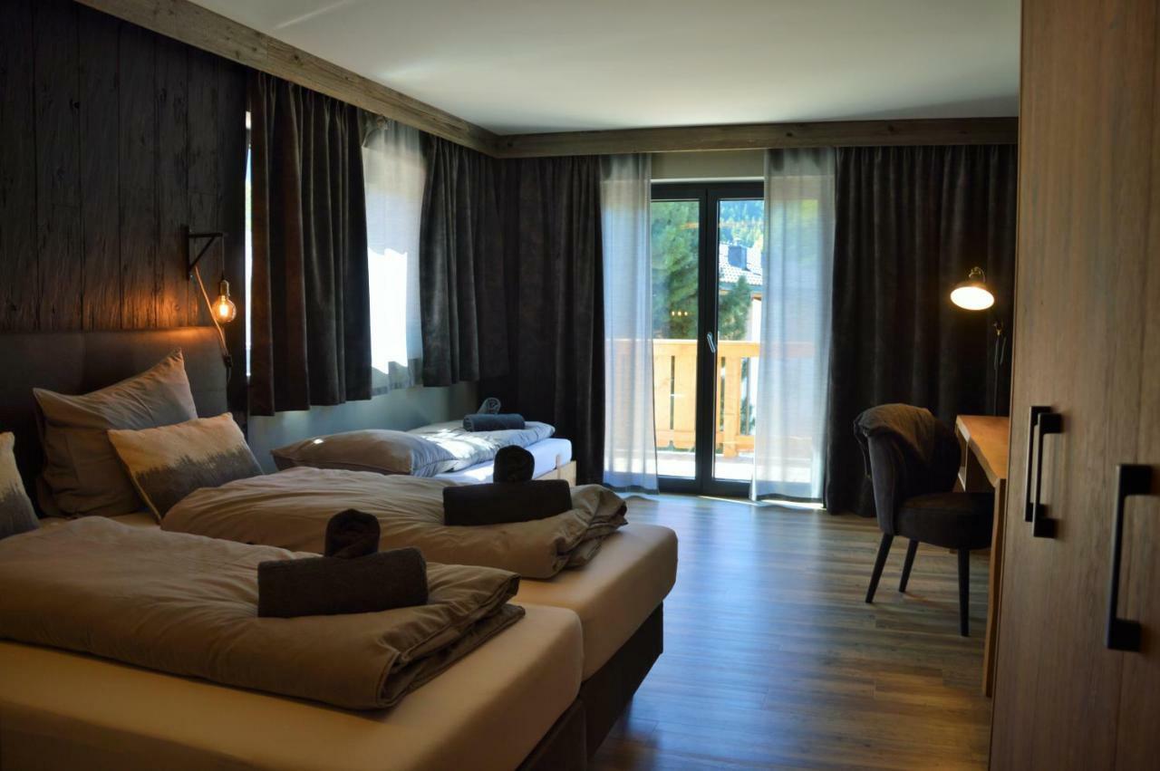 Dreibettzimmer mit Balkon