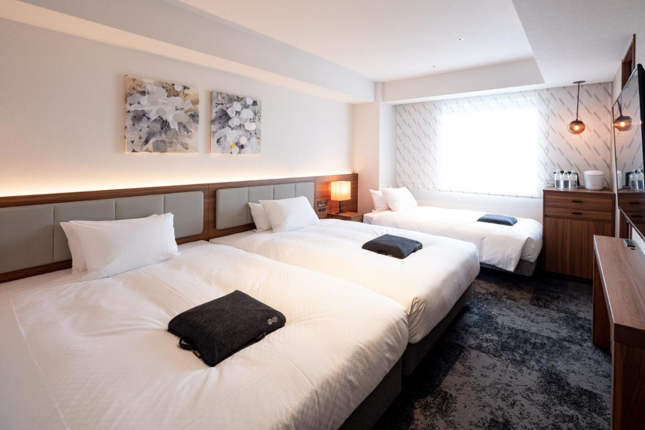 Deluxe Twin Room Two Double Beds Non-Smoking,973693249:JPEG