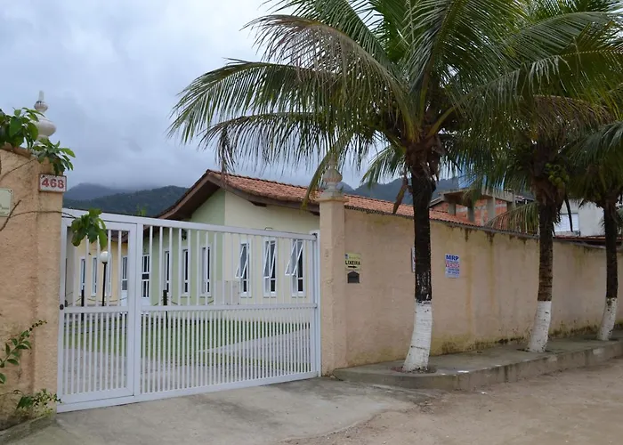 Casas Em Condominio Proximo Da Praia Com 2 Dormitorios, Churrasqueira E 3 Vagas De Garagem