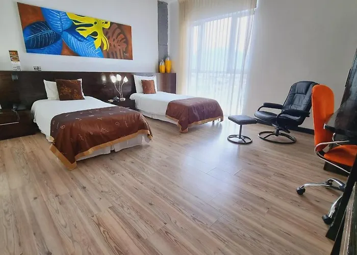 Habitat Suites Hotel By Gho Hoteles