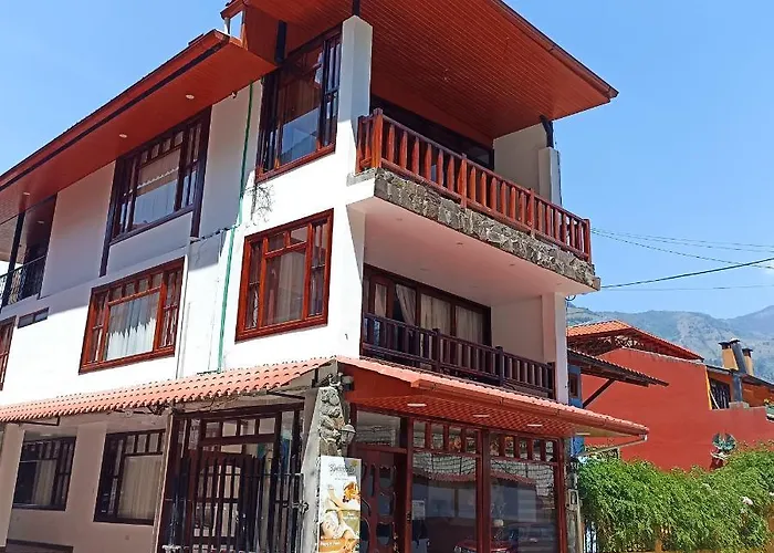 Posada J