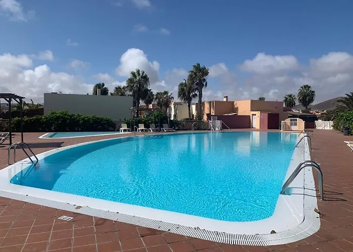 Bedroom With Shared Bathroom And Swimming Pool