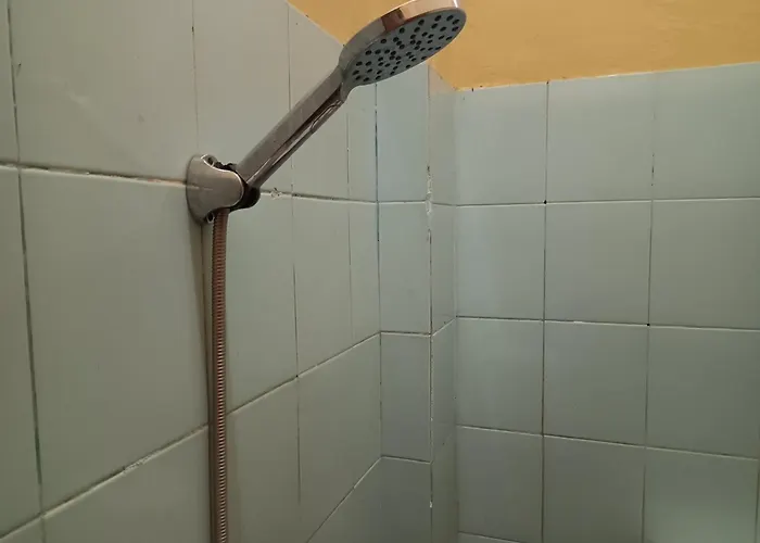 Oyo 93073 Penginapan 69