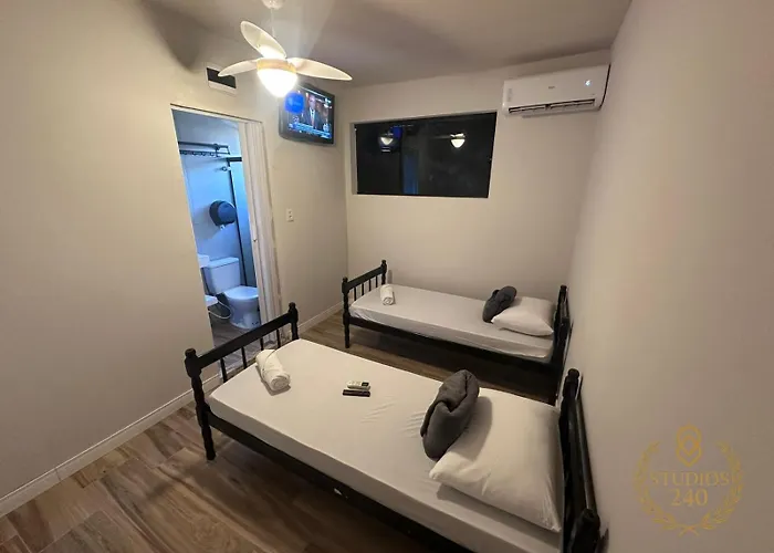 Suítes Modernas com Ar-Condicionado e Estacionamento