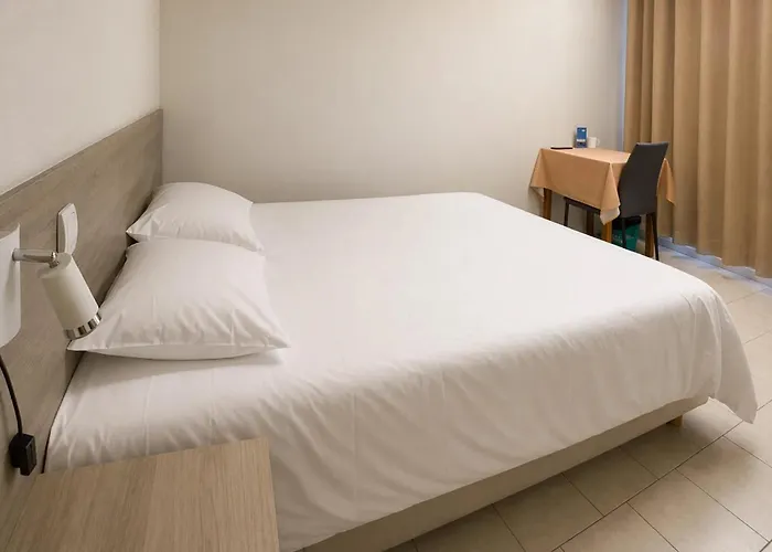 Hôtel Le Petit Logis Chambres Confort climatisées