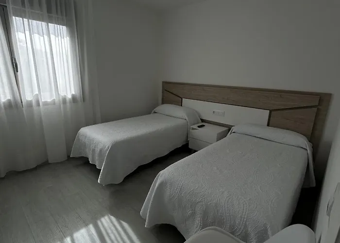Habitaciones A Postiña