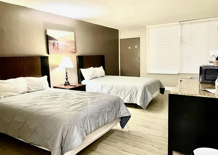 Apm Inn & Suites