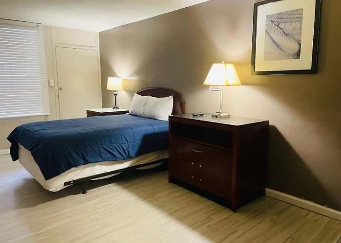 Apm Inn & Suites