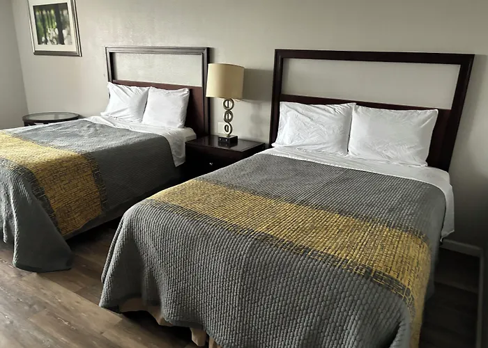 Apm Inn & Suites