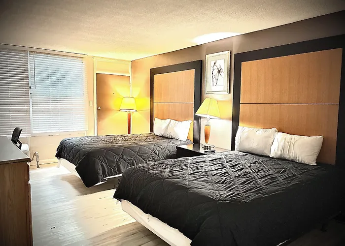 Apm Inn & Suites
