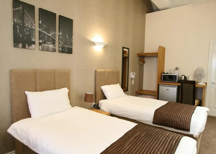 New County Hotel & Serviced Apartments By Roomsbooked